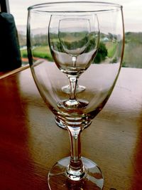 Close-up of wine glass on table