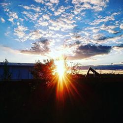 Sun shining through clouds