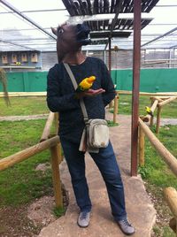 Full length of woman standing in park