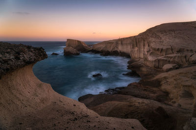Scenic view of sea against clear sky