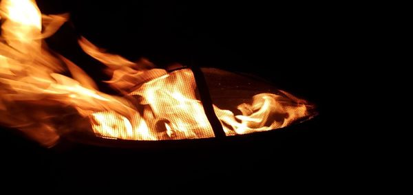 Close-up of fire in the dark