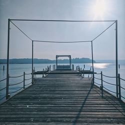 Pier on sea against sky