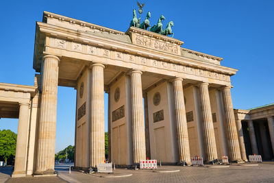 The brandenburg gate, berlins most famous landmark, on a sunny day