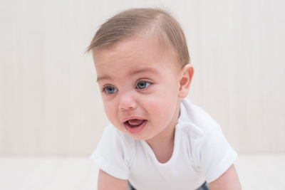 Portrait of cute boy at home