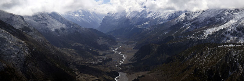 Panorama of mountains and snow in the himalayas trekking along annapurna circuit in nepal.