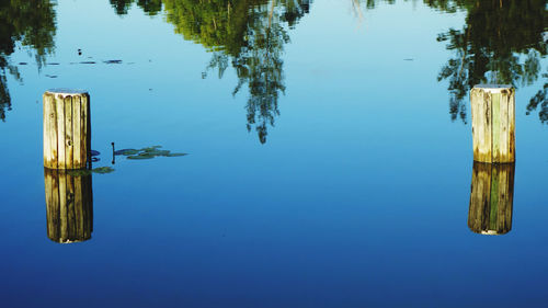 High angle view of wooden post in lake