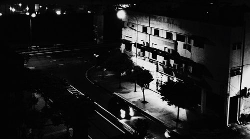 Buildings in city at night