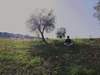 Person sitting on field