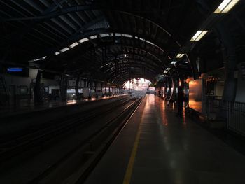 Illuminated railroad station platform