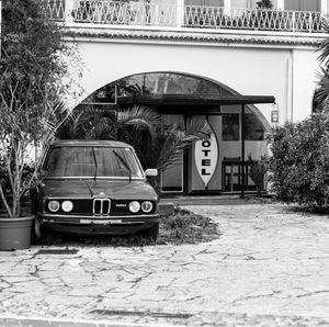 View of car on bridge against building