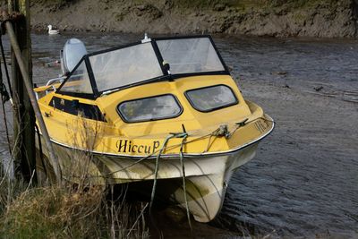 High angle view of abandoned car on beach