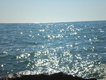 Scenic view of sea against clear sky