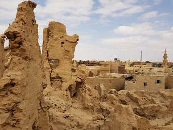 Old ruins of building against sky