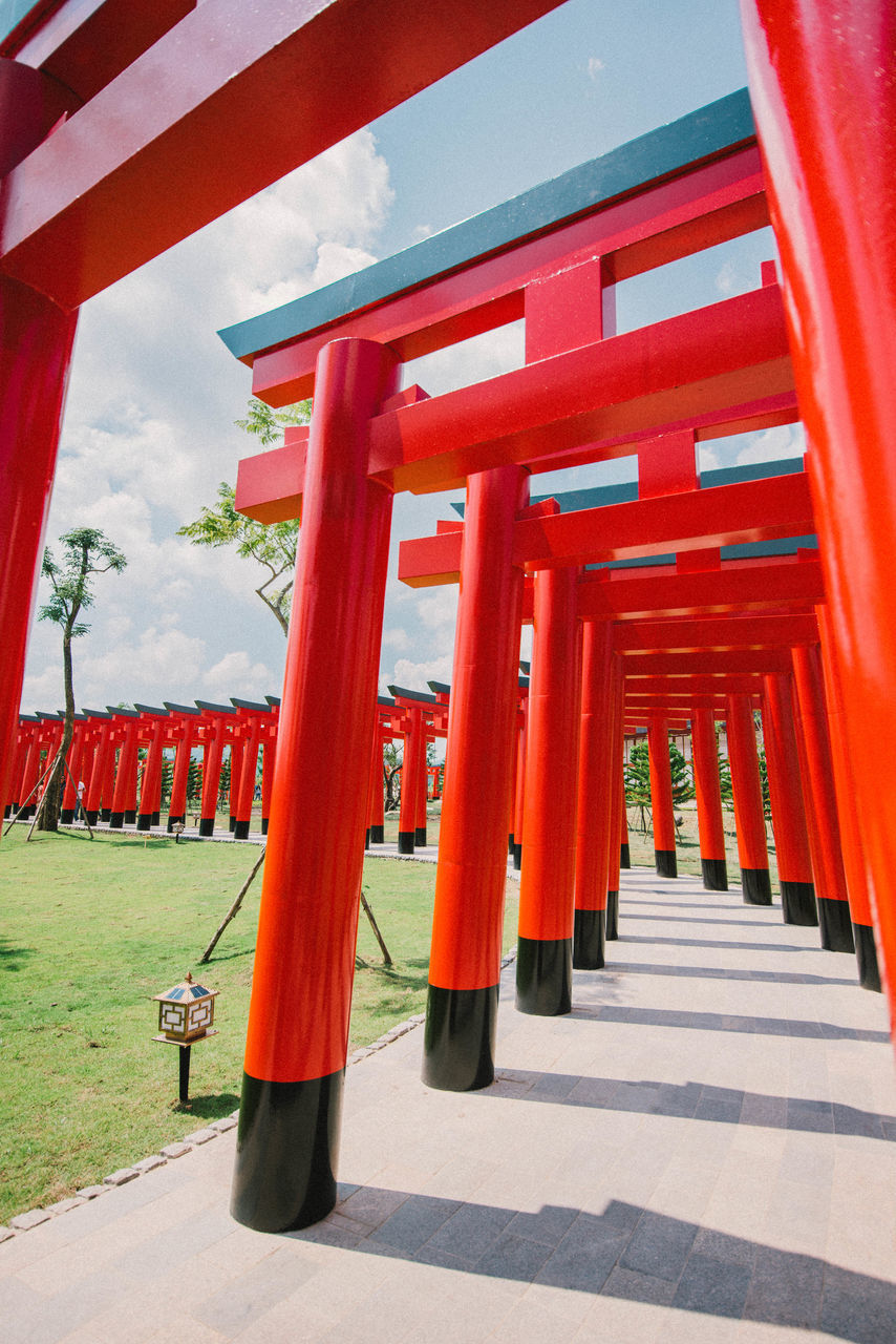 RED BELL TOWER AGAINST SKY