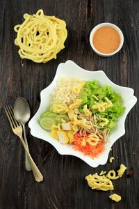 Asinan betawi. raw vegetable and bean curd salad with peanut dressing from betawi, jakarta