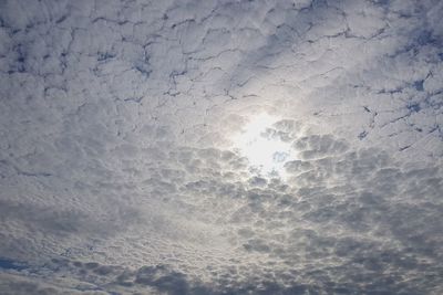 Low angle view of cloudscape against sky during winter