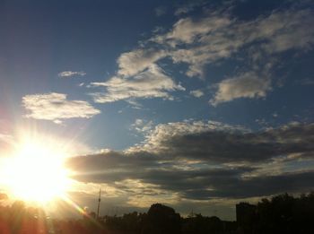 Sun shining through clouds