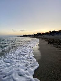 Scenic view of sea against sky during sunset