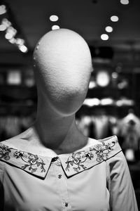 Rear view of man wearing hat at store