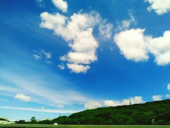 Scenic view of landscape against cloudy sky