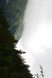 Scenic view of mountain against cloudy sky