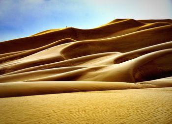 Scenic view of desert against sky