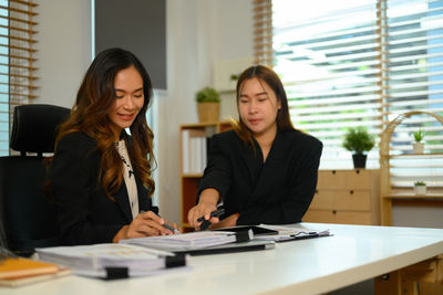 Business colleagues working at office