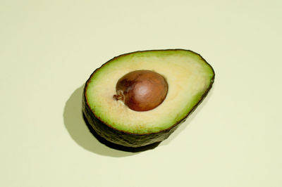 Close-up of fruit against white background