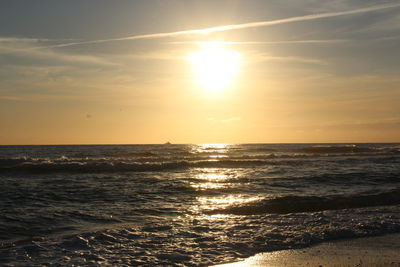 Scenic view of sea against sky at sunset