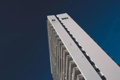 Low angle view of modern building against clear sky