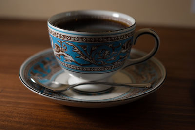 Close-up of coffee cup on table