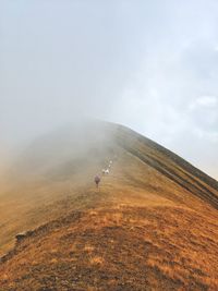 Scenic view of land against sky