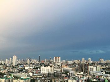 Modern buildings in city against sky