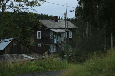 House with trees in background