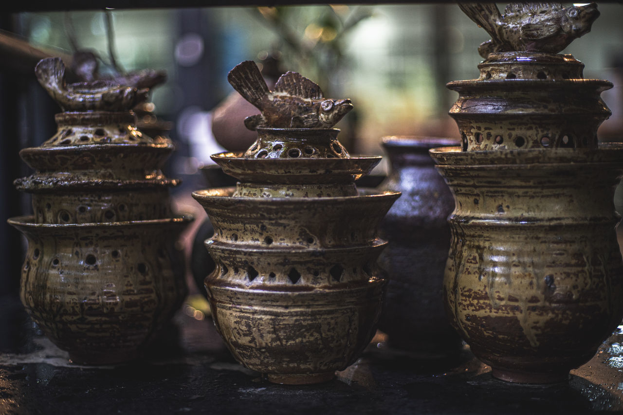 CLOSE-UP OF OBJECTS FOR SALE IN MARKET