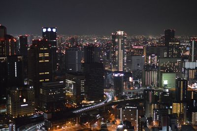 Illuminated cityscape at night