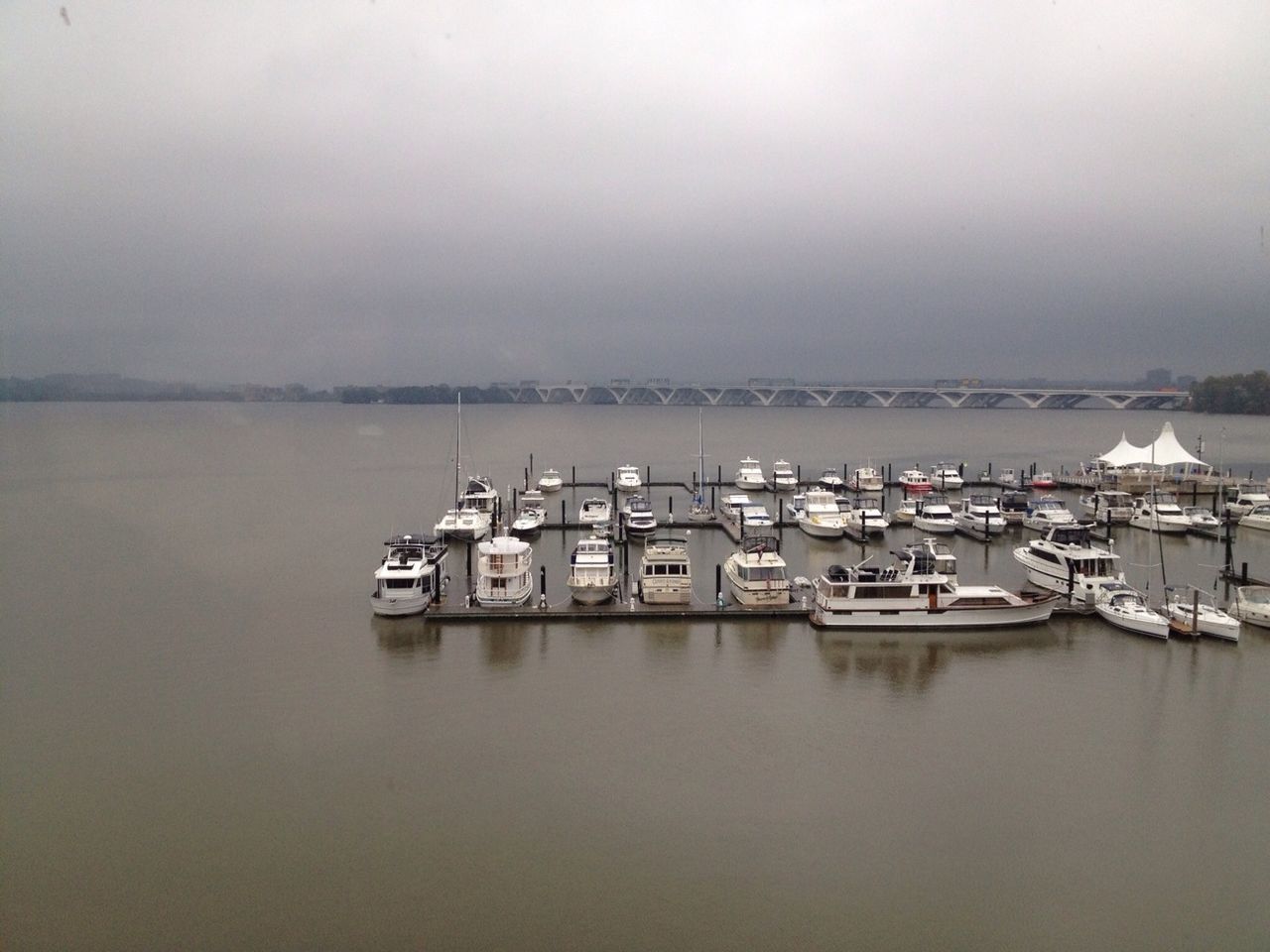 water, nautical vessel, transportation, boat, mode of transport, sea, waterfront, moored, tranquil scene, tranquility, sky, nature, copy space, scenics, fog, beauty in nature, horizon over water, lake, outdoors