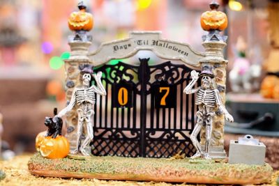 Close-up of skeleton figurines during halloween