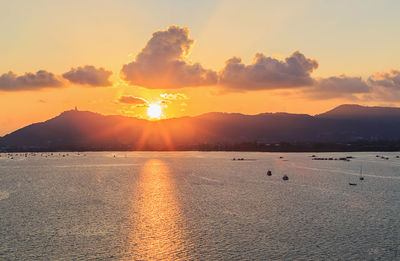 Scenic view of sea against sky during sunset