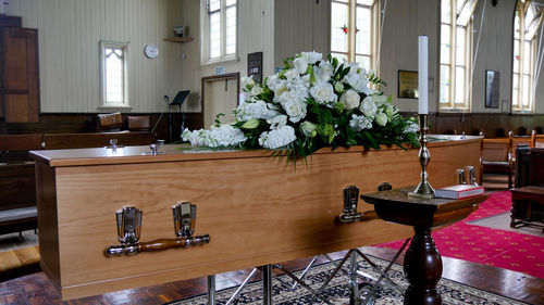 Close-up of coffin in church