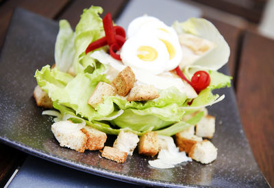 Close-up of salad in plate on table