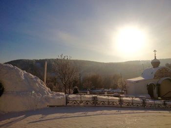 Scenic view of mountains against sky during winter