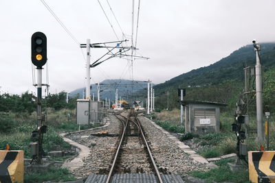 Railroad track against sky