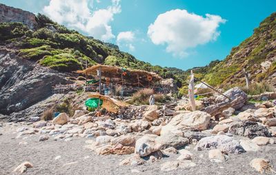 Panoramic view of rocks and mountains against sky