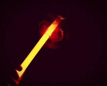 Close-up of fire in dark room