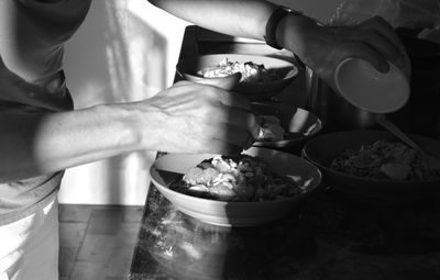 Woman holding ice cream in bowl