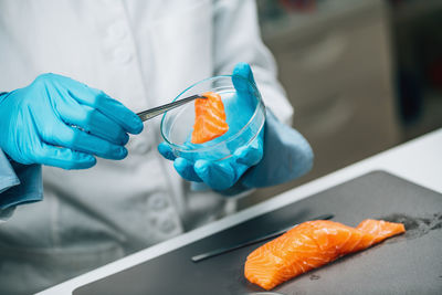 Food safety and quality control - microbiological analysis of salmon fish in laboratory