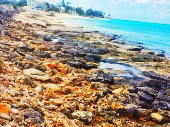 Scenic view of sea against cloudy sky