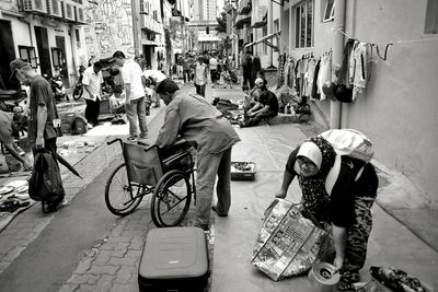 People on street in city