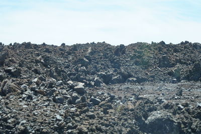 Scenic view of rocks against sky